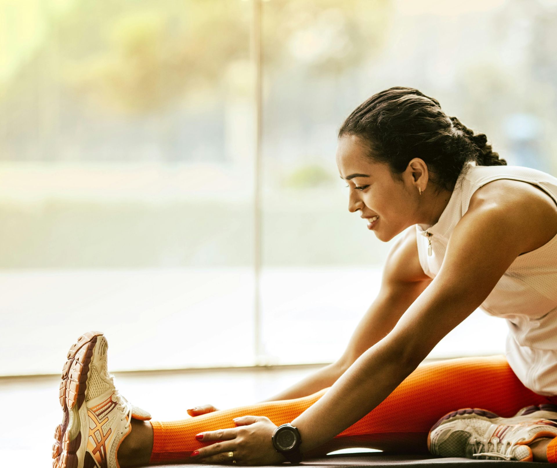 Woman Stretching on Ground